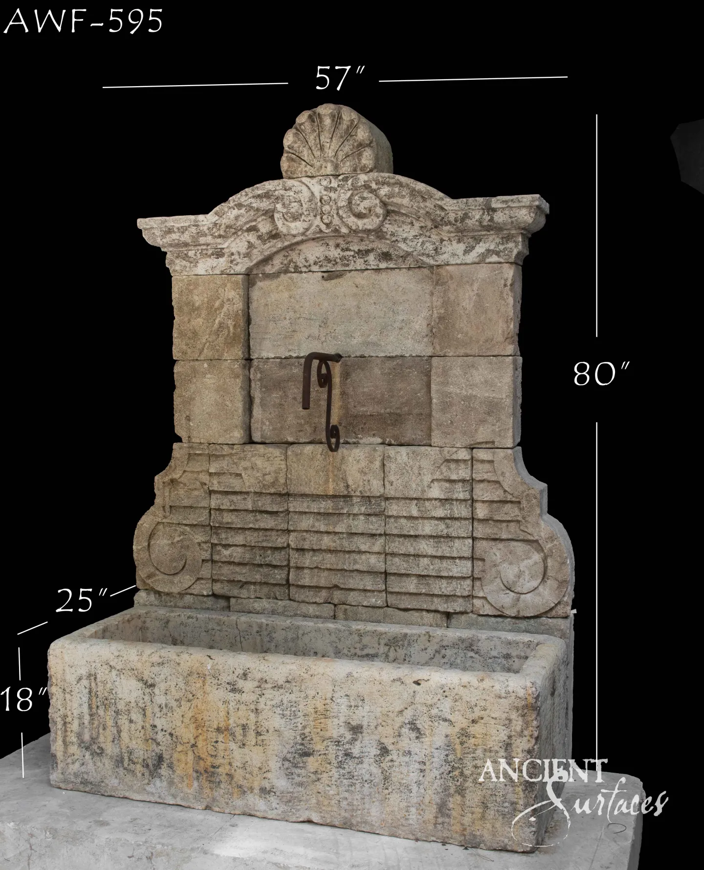 Baroque reclaimed limestone wall fountain shown with dimensions, scallop-shell crest and fluted frieze over a monolithic trough